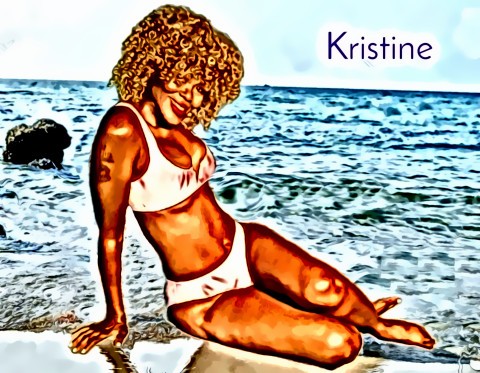 Kristine Joy, a stunning exotic GFE companion with silky cocoa skin and a slender curvy figure, smiling elegantly