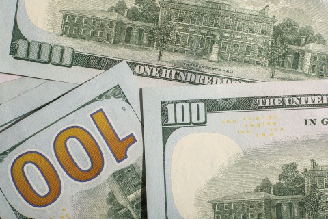 Client counting cash for escort payment
