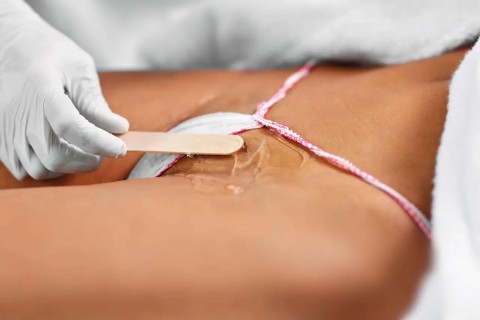 Intimate grooming during bikini waxing