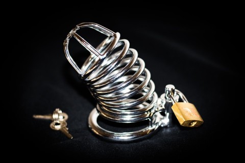 Closed chastity cage with small padlock