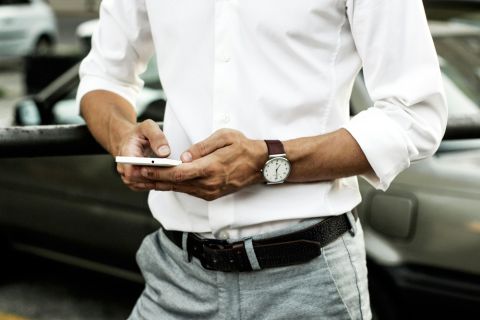 Man writing a first message to an escort.