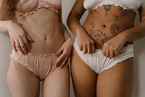 Two women sharing designer vagina surgery experience
