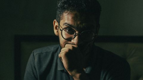 Nervous man calming himself before an escort date
