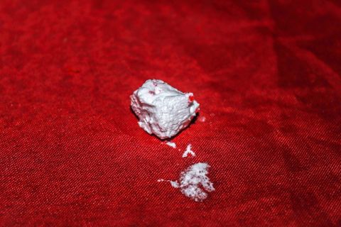 Drugs visible on table during client meeting