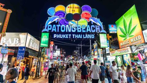 Bangla Road nightlife with neon signs and crowded party street