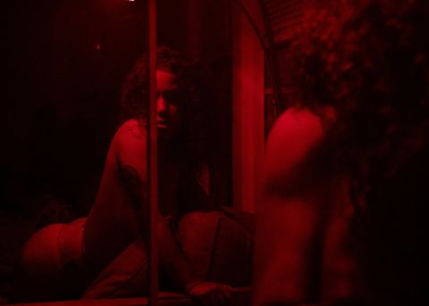 Woman standing confidently representing legal sex work rights