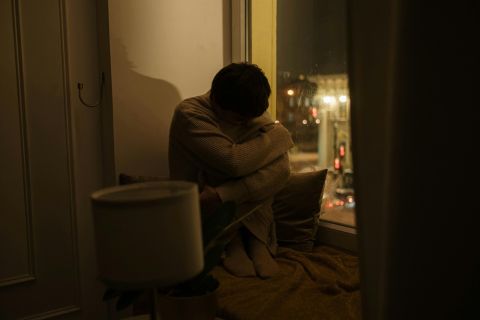Escort sitting alone feeling emotionally lonely