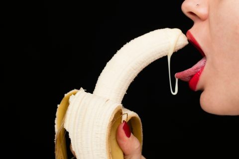 Woman mastering oral pleasure techniques with confidence