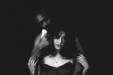Husband of an escort hugging wife after work.