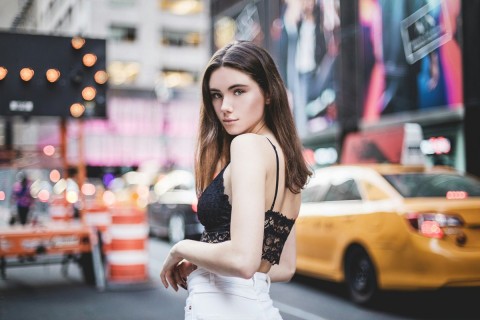 NYC escort woman waiting for client outdoors