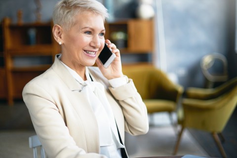 Older woman talking to male escort
