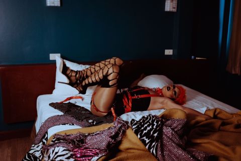 Passive trans escort during professional photoshoot