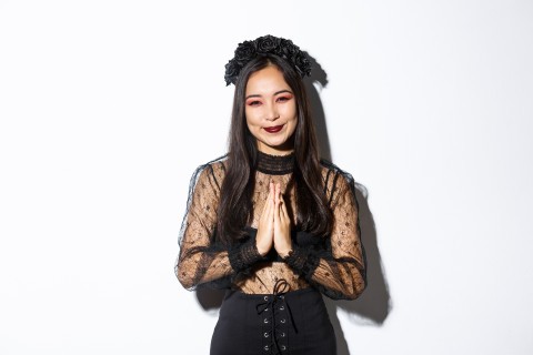 Praying sexy girl mixing faith and desire