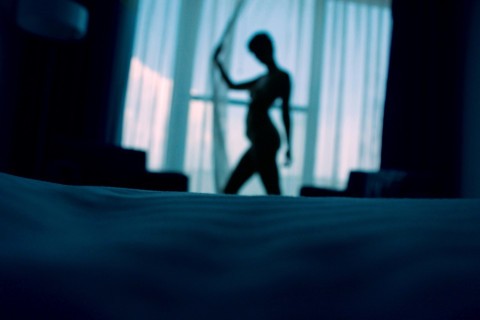 Escort client and escort meeting professionally in hotel room