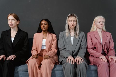Sex worker facing burnout barriers in mirror reflection