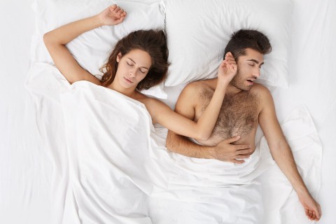 Couple struggling with sexsomnia disorder