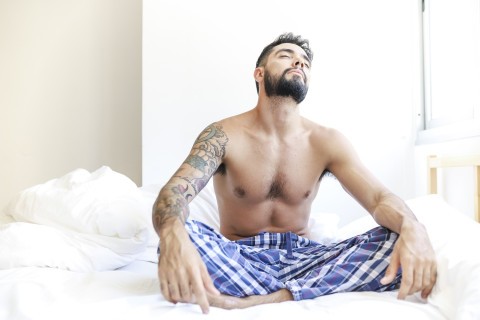 Man waking up thinking about sexual activity