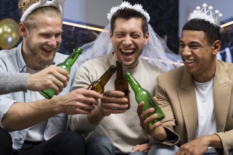 Strip dancers performing safely at party