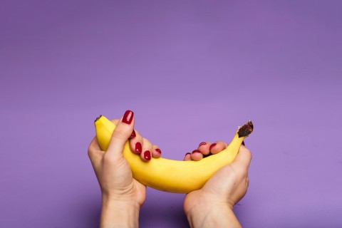 A masterful hand performing a sensual handjob.
