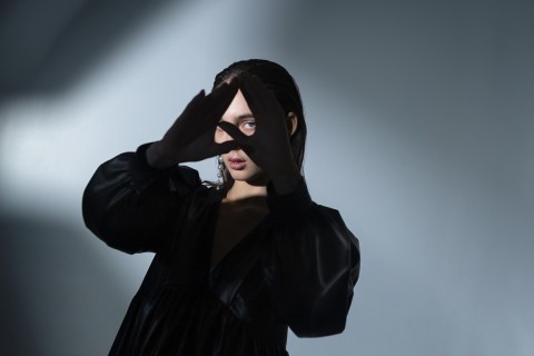 An escort discreetly gathering intelligence from a client.