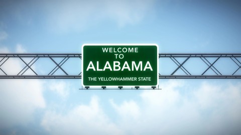 Welcome to Alabama sign representing the state’s new tax targeting adult websites.