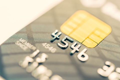 Close-up of Visa and Mastercard credit cards symbolizing financial power and control.