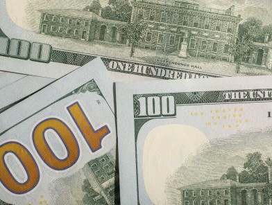Client counting cash for escort payment