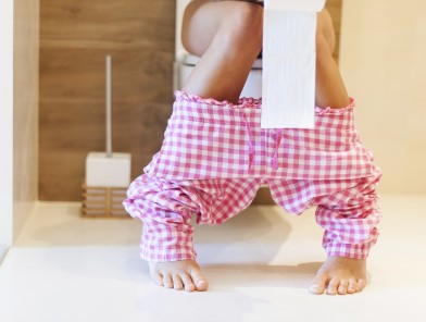 Woman peeing after sex on toilet