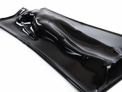 BDSM vacuum bed sealed around a body