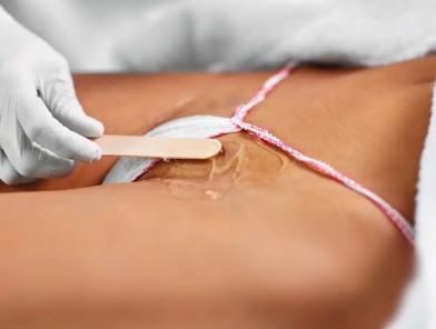 Intimate grooming during bikini waxing