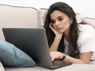 Woman boosting profile on escort directory.