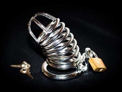 Closed chastity cage with small padlock