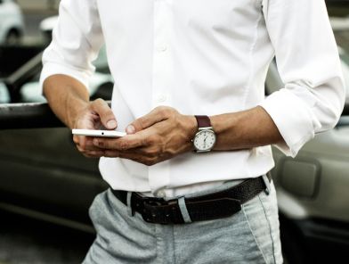 Man writing a first message to an escort.