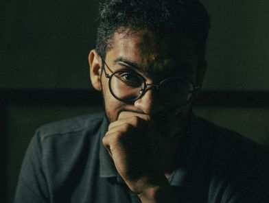 Nervous man calming himself before an escort date