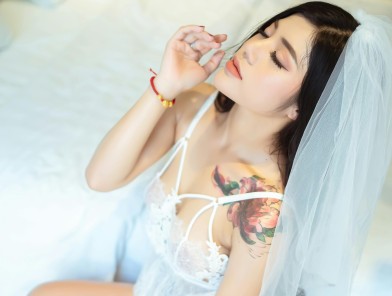 Beautiful former escort in a wedding dress