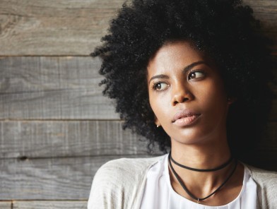 Woman looking at open door after leaving sex work