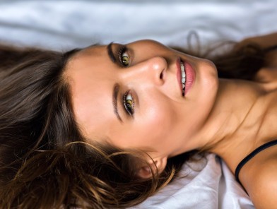 Female orgasm shown in soft moment.