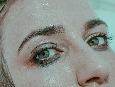 Woman enjoying giving cumshot with confident eye contact