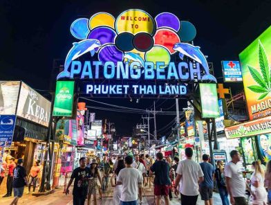 Bangla Road nightlife with neon signs and crowded party street