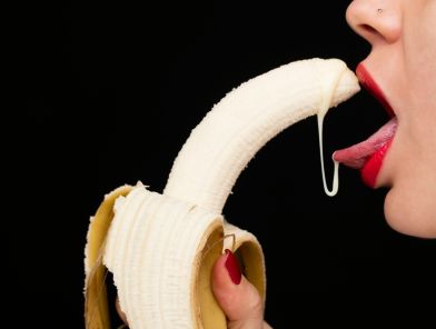 Woman mastering oral pleasure techniques with confidence