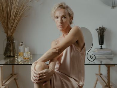 Older woman companion enjoying conversation with man