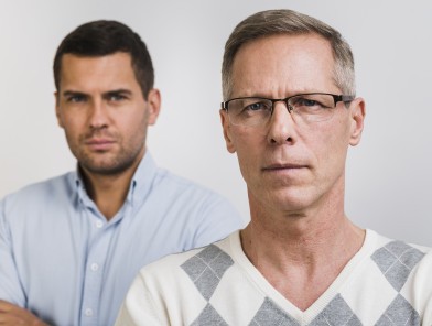 Young and older men symbolizing stages of male sexual performance