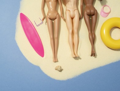 Nudist hotels poolside guests relaxing freely