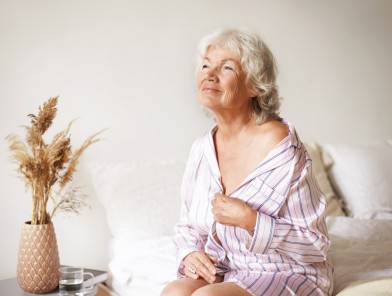 Senior woman preparing for sex