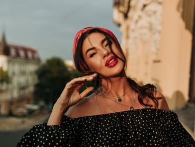 Elegant Spanish escort in luxury city setting