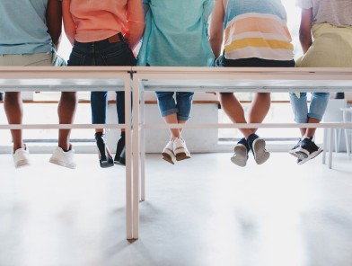Teenagers engaged in sex education class