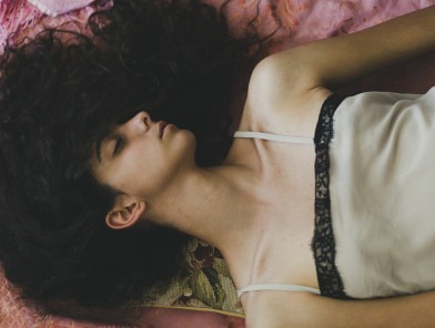 Woman expressing nymphomania through confidence and sensuality