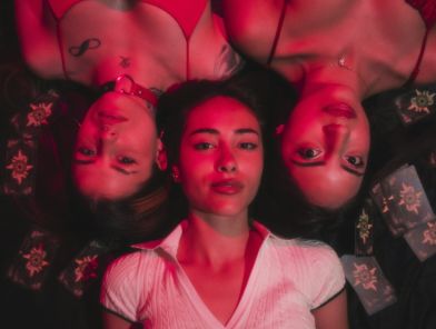 Group of elegant women attracting a man's desire
