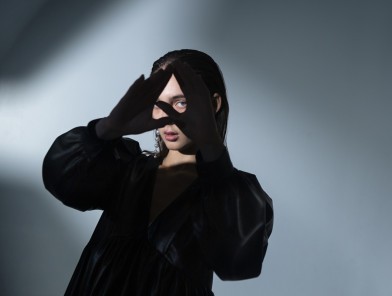 An escort discreetly gathering intelligence from a client.