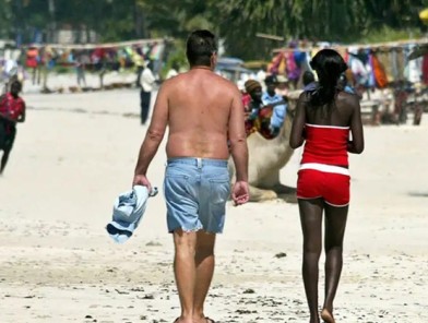Kenya’s beautiful coastline masks a hidden world of sex tourism fueled by European visitors, revealing stories of survival and exploitation.